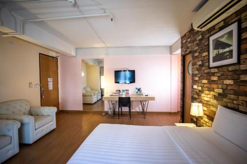 Ein Bett oder Betten in einem Zimmer der Unterkunft ibis Styles Chiang Mai