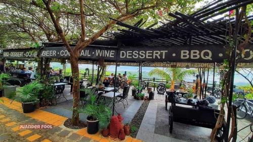 a restaurant with a sign that reads wine desert at ROCCA Del GARDA Residences in Binangonan