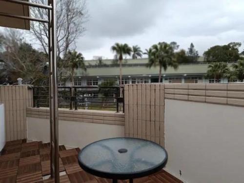 Un balcón o terraza de Dahu Yipinyuan B&B