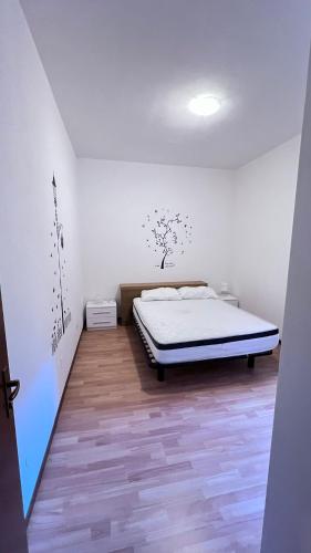 El Porteño #3 HOWME tesisinde bir odada yatak veya yataklar