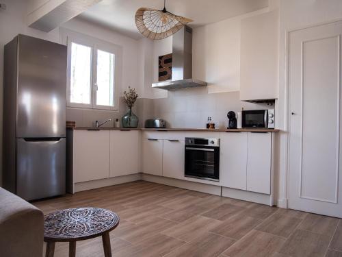 Η κουζίνα ή μικρή κουζίνα στο Charmant & Spacieux appartement à Perpignan
