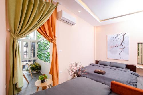 Voodi või voodid majutusasutuse Serene Homestay toas