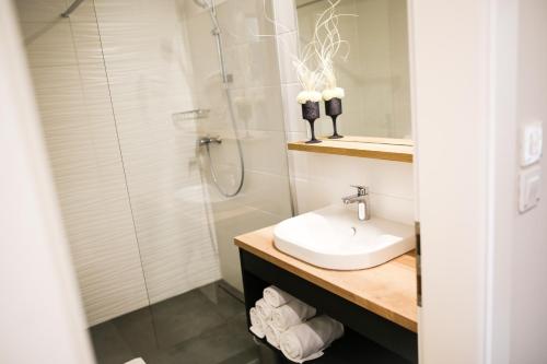 Koupelna v ubytování Ambient Hotel