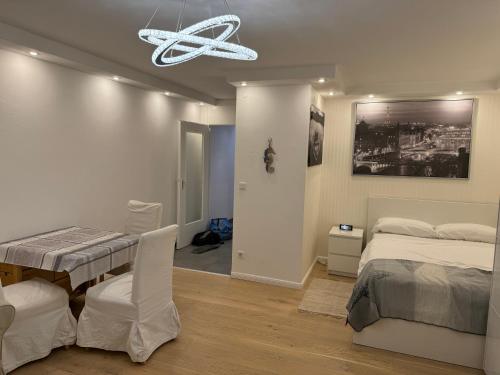 Ένα ή περισσότερα κρεβάτια σε δωμάτιο στο Comfortable Studio Nuremberg