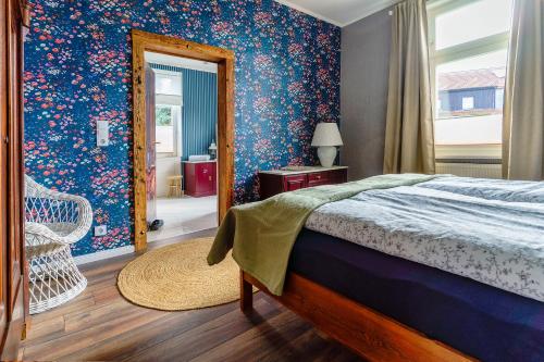 Ένα ή περισσότερα κρεβάτια σε δωμάτιο στο Ferienwohnung Ziegelbergsweg