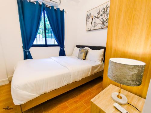 Postel nebo postele na pokoji v ubytování MP Apartments Leyte
