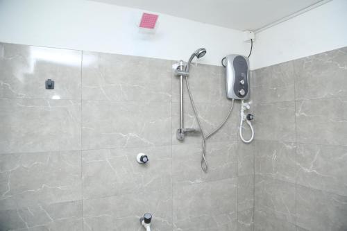 Koupelna v ubytování Rose Fort Homestay
