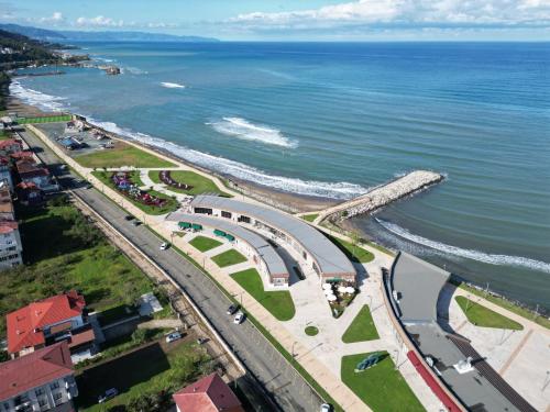 an aerial view of a beach with a bridge at MARİNO HOTEL in Gulyali