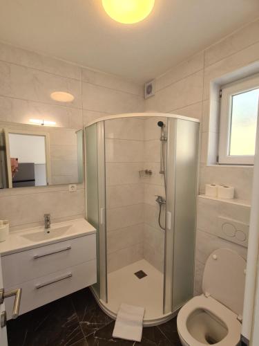 Koupelna v ubytování Počitniški dom Portorož / Portoroz Holiday Home