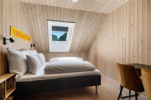 Un ou plusieurs lits dans un hébergement de l'établissement Wangen Apartments by Fjord Resort