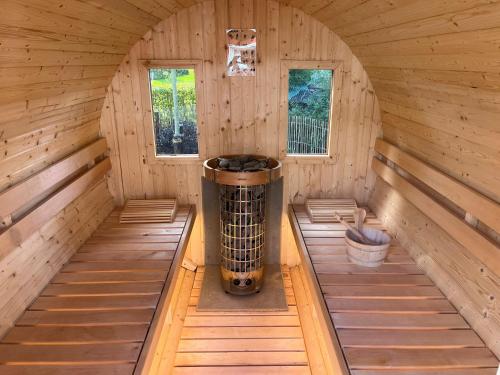 an inside view of a sauna with wooden walls at Ferienhaus Deine Zeit mit SAUNA und WALLBOX in Nettersheim