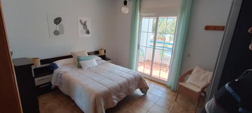 En eller flere senge i et værelse på Apto Blanes - WIFI GRATIS