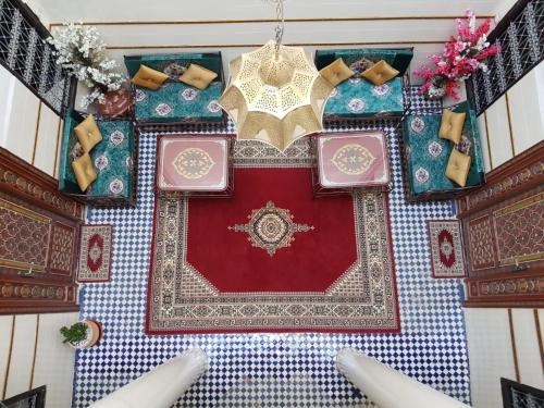 an overhead view of a table with plates on it at Dar Atlantic in Fès