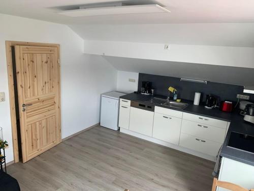Kuchyň nebo kuchyňský kout v ubytování Ferienapartment Allgäu-Idyll (Dietmannsried)