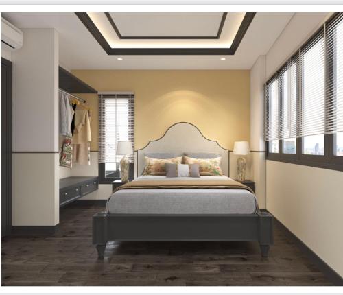 ein Schlafzimmer mit einem Bett und einem Dachfenster in der Unterkunft Homie Hoi An in Hoi An