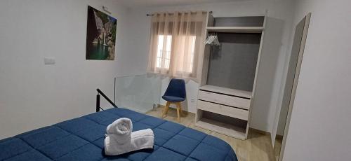 Postel nebo postele na pokoji v ubytování Casa Cazorla c del valle II