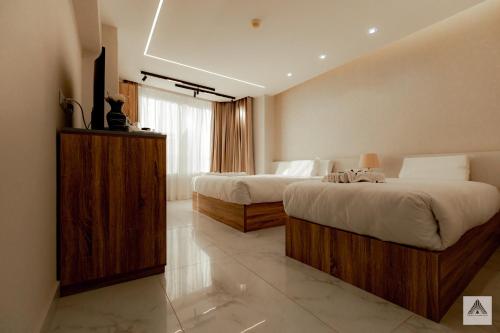 En eller flere senger på et rom på Khattab Pyramids View Hotel