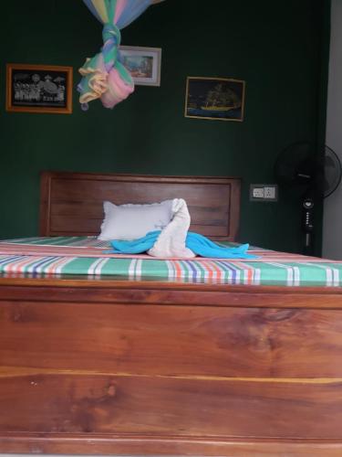 Postel nebo postele na pokoji v ubytování Tiny Homestay
