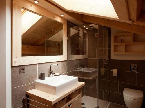 a bathroom with a sink and a mirror at Chalet Argentière, 6 pièces, 12 personnes - FR-1-343-181 in Chamonix