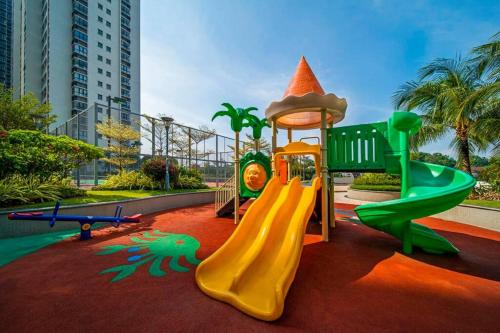 a playground with a slide and a slideintend at Modern Studio 4 pax Danga Bay Shopping Mall in Johor Bahru
