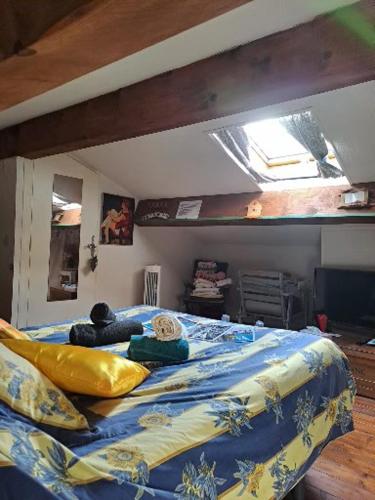 Katil atau katil-katil dalam bilik di ICI et MAINTENANT Chambres chez l'Habitant