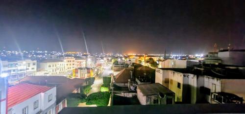 a view of a city at night with lights at Seahawk Plateau 3A Apt on Rua Pedonal Praia Cape Verde in Praia