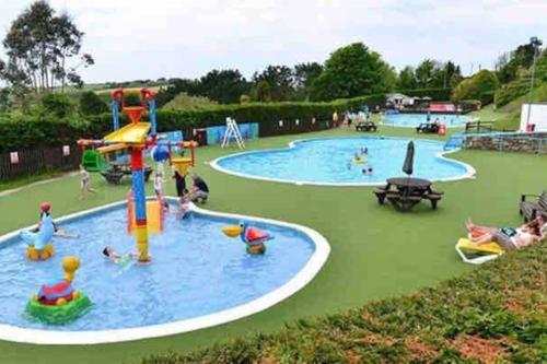 an image of a water park with people in it at Immaculate 2020 Caravan on Newquay Holiday Park in Newquay