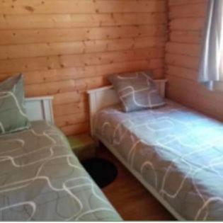 Кровать или кровати в номере Travellers Rest cabin