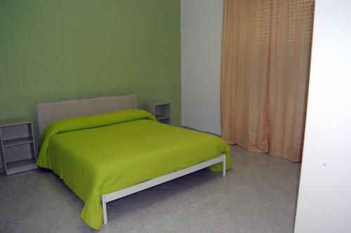 Posteľ alebo postele v izbe v ubytovaní Home's Vita