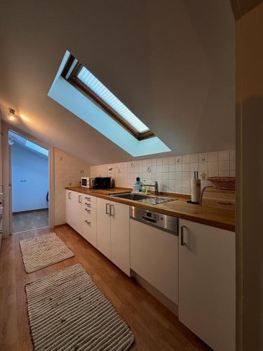 Cuisine ou kitchenette dans l'établissement RM-Apartments