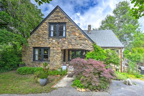 a stone house with some plants in front of it at Asheville Urban Farmhouse Entire Home 4 mi to DT in Asheville