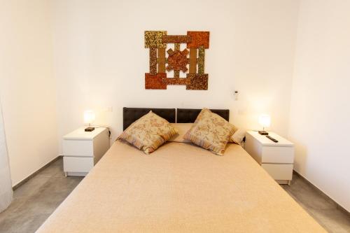 Postel nebo postele na pokoji v ubytování La Spezia Holidays 123