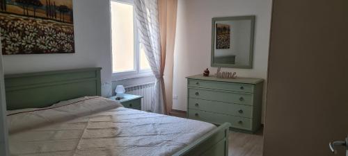 Postel nebo postele na pokoji v ubytování Casa Adriana