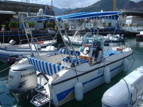 a group of boats docked in a harbor at A casa di Chiara Salerno in Salerno