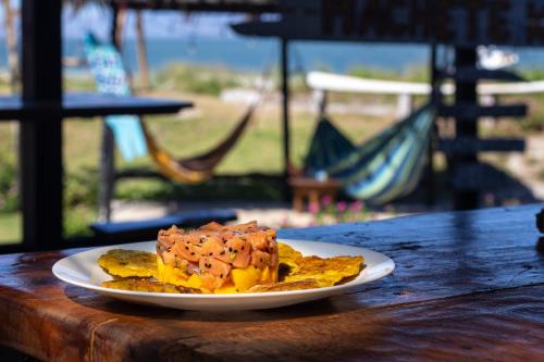 a plate of food sitting on a table at Machete WING SURF KITE & FOIL in Punta Chame