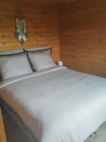 Postel nebo postele na pokoji v ubytování Winiec Mobile Home