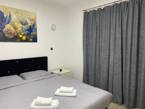 Apartmani Braća Kovačevićにあるベッド