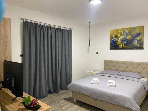 Apartmani Braća Kovačevićにあるベッド