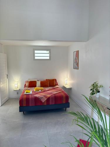 Postel nebo postele na pokoji v ubytování Les Villas du Bambou - Villa PAPRIKA jusqu'à 6 pers