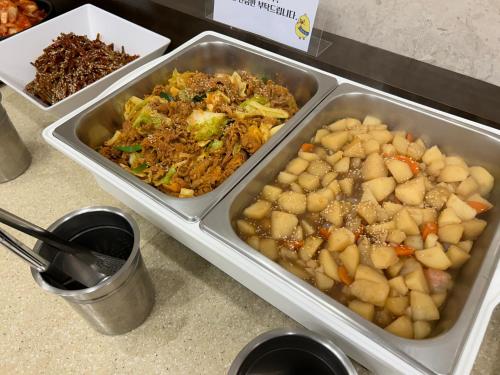 three trays of food on a counter in a store at Toyoko Inn Seoul Gangnam in Seoul