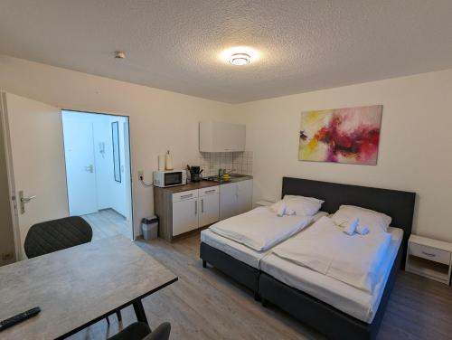 En eller flere senge i et værelse på City-Apartment & Lift ,Tannen C6