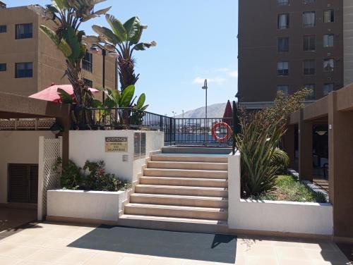 a set of stairs in front of a building at Apartamento en Iquique in Iquique