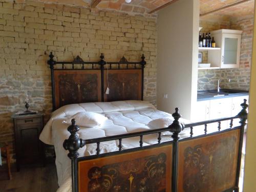 A bed or beds in a room at Cascina Romanino