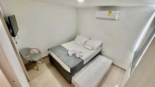 Uma cama ou camas num quarto em La Magnifica by Olamar Living
