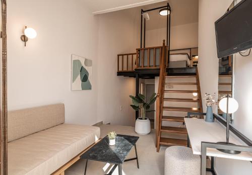 sala de estar con sofá y litera en Casa Veneta, en La Canea