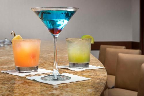 a table with two cocktails on a table at Hyatt Place Sugar Land in Sugar Land