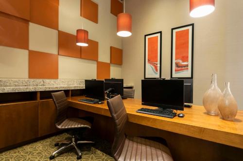 an office with two desks with two computers on them at Hyatt Place Manati in Manati