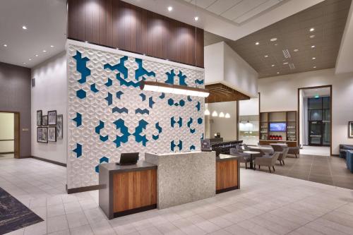 a lobby of a hotel with a reception desk at Hyatt Place Park City in Park City
