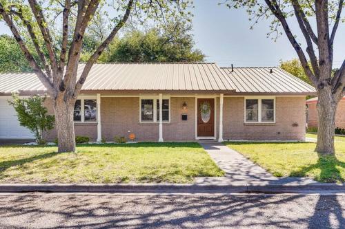 a house with trees in front of it at HOT TUB - Beautifully Renovated Home in West Texas in Fort Stockton