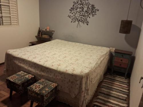 Posteľ alebo postele v izbe v ubytovaní Aconchego